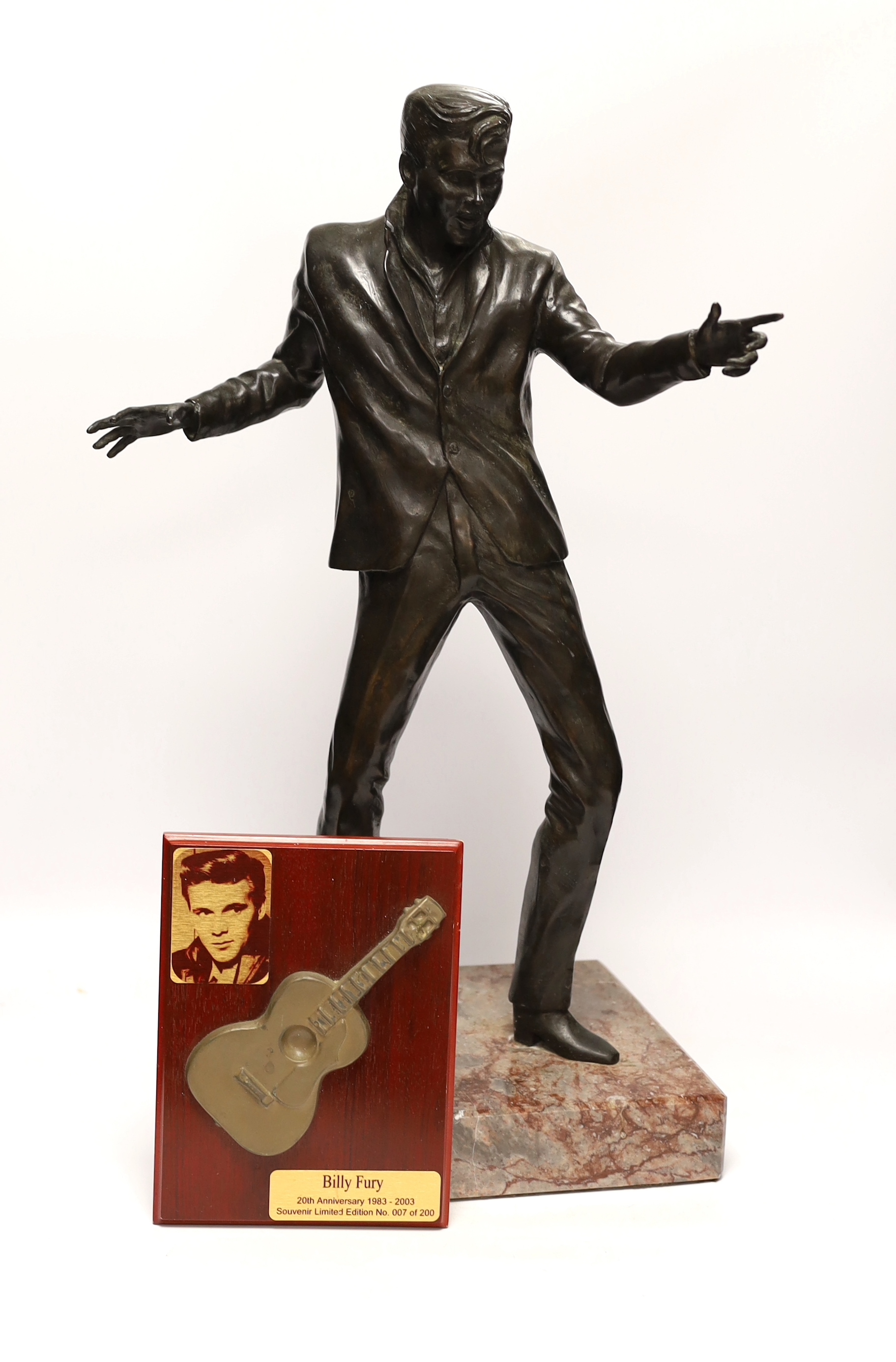 A bronze statue of Billy Fury, one of five cast by Tom Murphy, based on the public statue at the Albert Dock, Liverpool, together with a limited edition plaque, produced and sold to raise money to fund the installation o